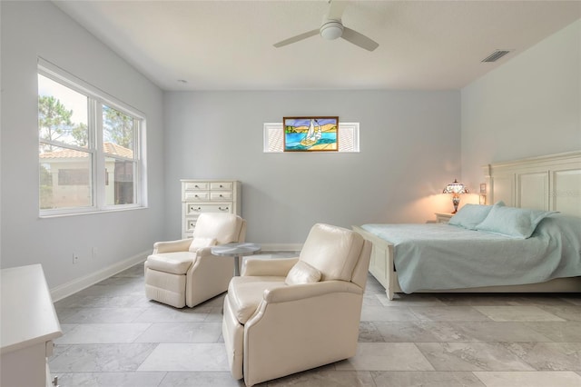 2816 E Venetian Lake Cir, New Smyrna Beach, FL 32168 - bedroom featuring baseboards and a ceiling fan
