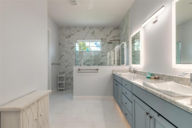 2816 E Venetian Lake Cir, New Smyrna Beach, FL 32168 - bathroom with a marble finish shower and double vanity