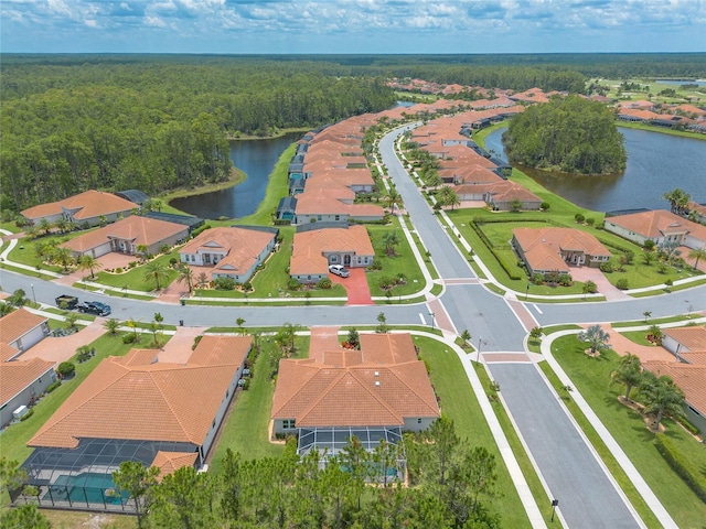 2816 E Venetian Lake Cir, New Smyrna Beach, FL 32168 - aerial overview of property's location with a large body of water and nearby suburban area
