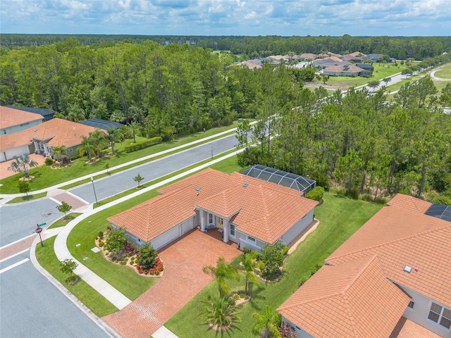 2816 E Venetian Lake Cir, New Smyrna Beach, FL 32168 - aerial view of residential area with a forest