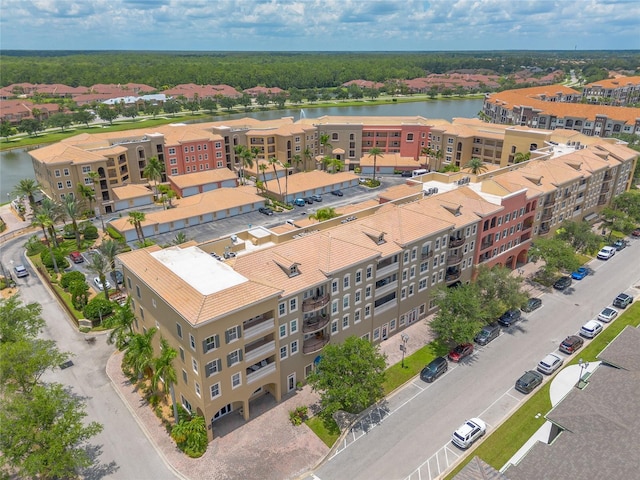 2816 E Venetian Lake Cir, New Smyrna Beach, FL 32168 - drone / aerial view of apartment complex / building and a nearby body of water