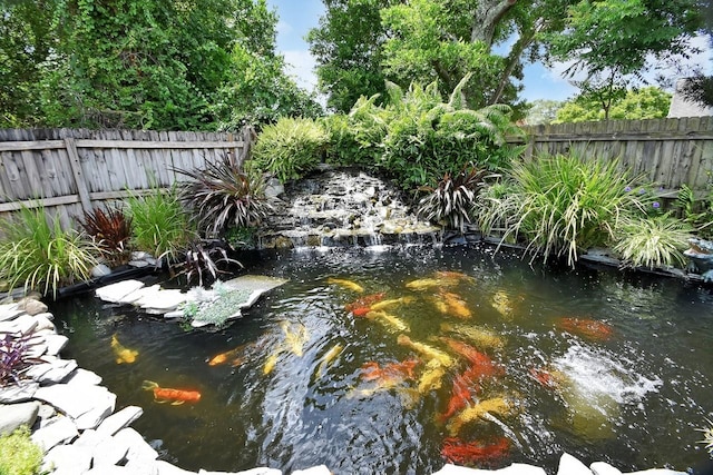 1366 Valhalla St, Deltona, FL 32725 - view of yard featuring a garden pond