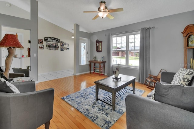 1366 Valhalla St, Deltona, FL 32725 - living area featuring vaulted ceiling, ceiling fan, and light wood-style floors