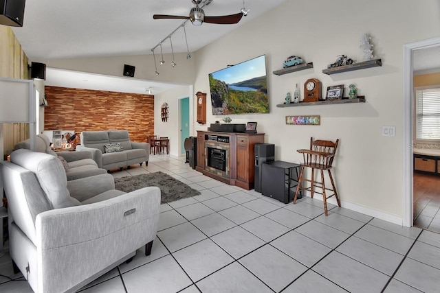 1366 Valhalla St, Deltona, FL 32725 - living area with vaulted ceiling, ceiling fan, and light tile patterned flooring