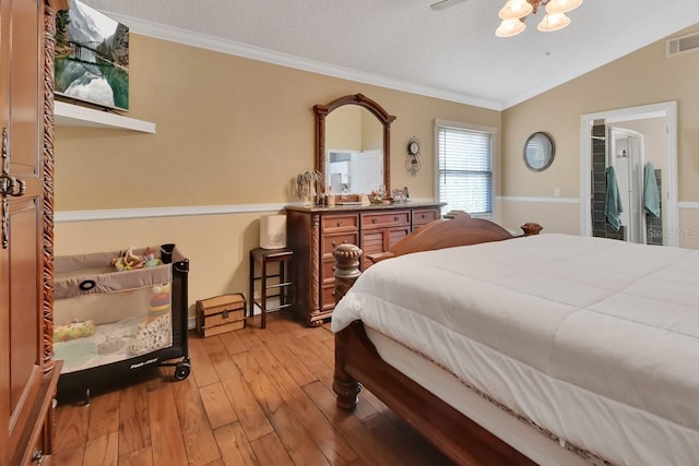 1366 Valhalla St, Deltona, FL 32725 - bedroom with ornamental molding, lofted ceiling, and hardwood / wood-style floors