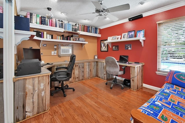 1366 Valhalla St, Deltona, FL 32725 - office space with a ceiling fan, wood finished floors, a textured ceiling, crown molding, and built in desk