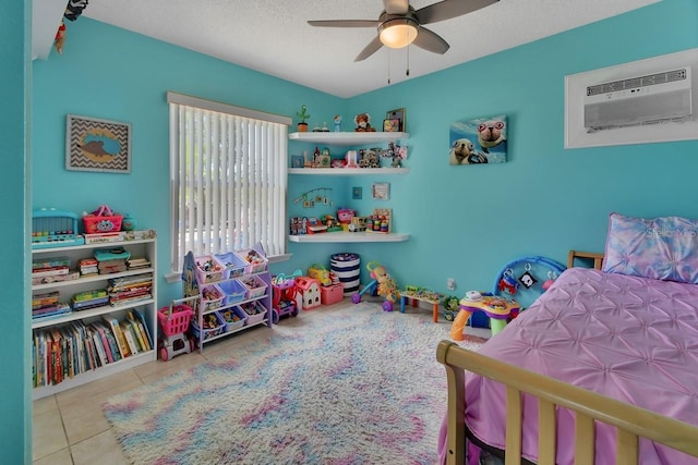 1366 Valhalla St, Deltona, FL 32725 - bedroom featuring tile patterned flooring, a ceiling fan, a textured ceiling, and a wall mounted air conditioner