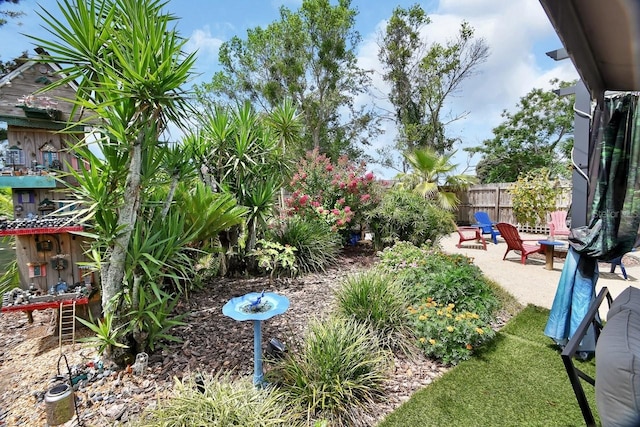 1366 Valhalla St, Deltona, FL 32725 - view of yard featuring a fire pit and a patio