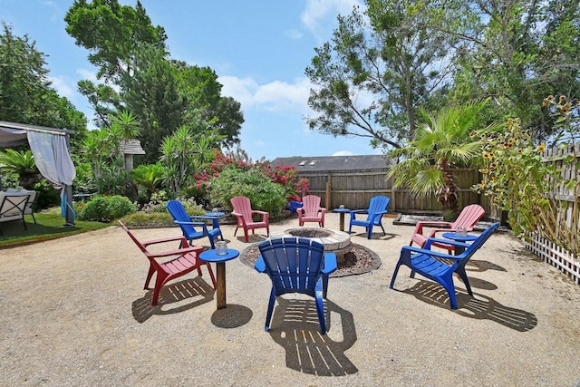 1366 Valhalla St, Deltona, FL 32725 - view of patio / terrace with an outdoor fire pit