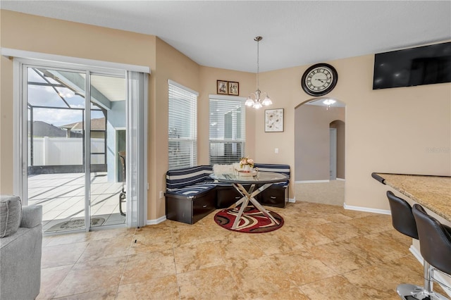 710 Grape Ivy Ln, New Smyrna Beach, FL 32168 - dining room with arched walkways and healthy amount of natural light