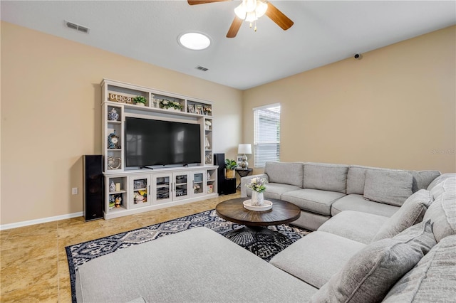 710 Grape Ivy Ln, New Smyrna Beach, FL 32168 - living area with ceiling fan and baseboards