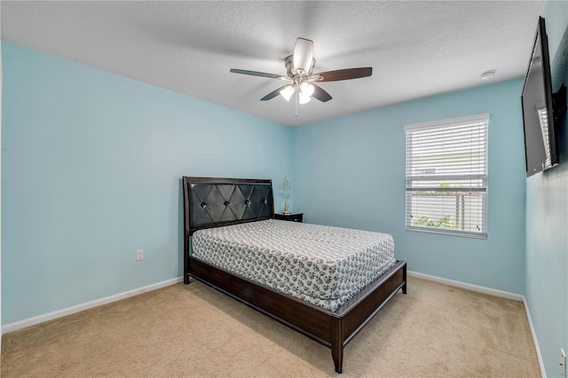 710 Grape Ivy Ln, New Smyrna Beach, FL 32168 - carpeted bedroom featuring baseboards and a ceiling fan