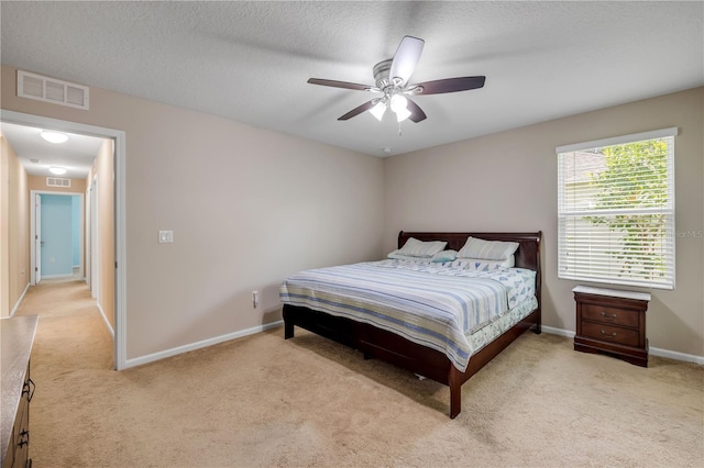 710 Grape Ivy Ln, New Smyrna Beach, FL 32168 - bedroom with carpet floors and ceiling fan