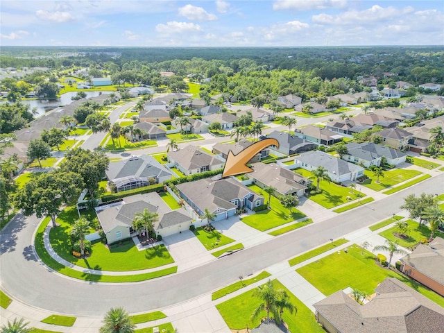 710 Grape Ivy Ln, New Smyrna Beach, FL 32168 - aerial perspective of suburban area with a large body of water