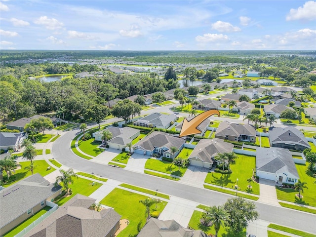 710 Grape Ivy Ln, New Smyrna Beach, FL 32168 - aerial view of residential area with a nearby body of water