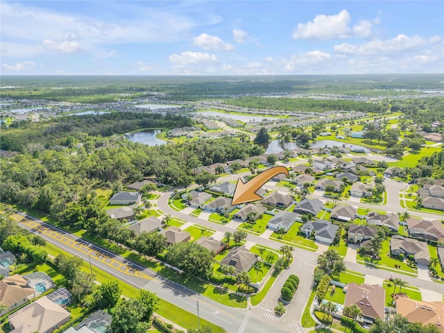 710 Grape Ivy Ln, New Smyrna Beach, FL 32168 - aerial perspective of suburban area with a nearby body of water