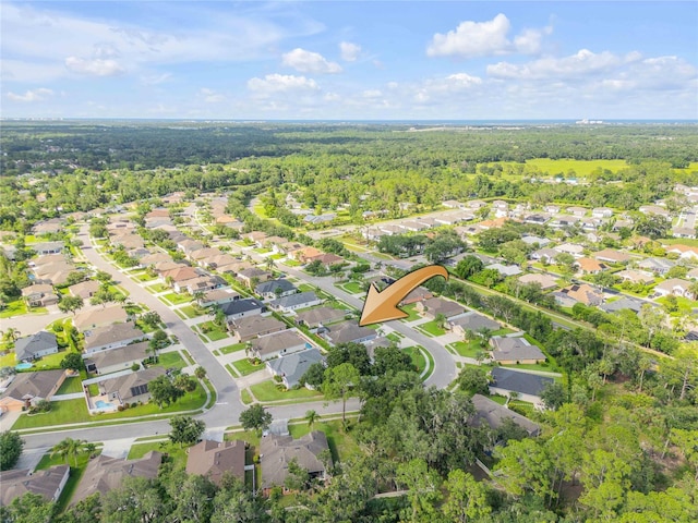 710 Grape Ivy Ln, New Smyrna Beach, FL 32168 - aerial view of property and surrounding area featuring a forest and nearby suburban area