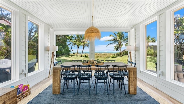 943 S Atlantic Ave, Cocoa Beach, FL 32931 - sunroom / solarium featuring wood finished floors and wooden ceiling