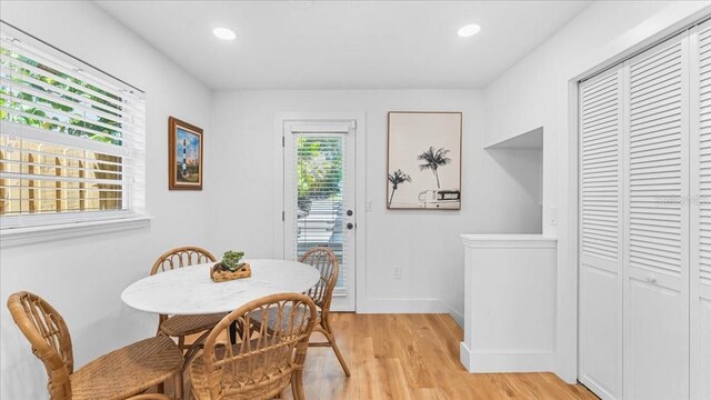 943 S Atlantic Ave, Cocoa Beach, FL 32931 - dining room featuring light wood finished floors and recessed lighting