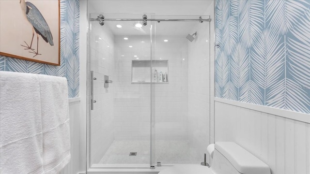 943 S Atlantic Ave, Cocoa Beach, FL 32931 - bathroom with a shower stall and wallpapered walls
