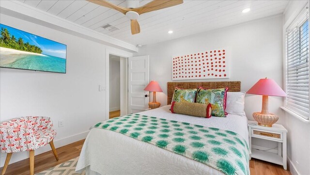 943 S Atlantic Ave, Cocoa Beach, FL 32931 - bedroom with wood finished floors, recessed lighting, wood ceiling, and a ceiling fan