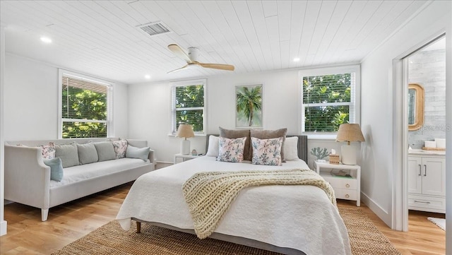 943 S Atlantic Ave, Cocoa Beach, FL 32931 - bedroom featuring wooden ceiling, multiple windows, light wood-style floors, ensuite bath, and recessed lighting