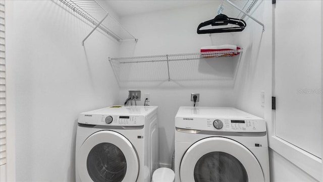 943 S Atlantic Ave, Cocoa Beach, FL 32931 - laundry room with separate washer and dryer