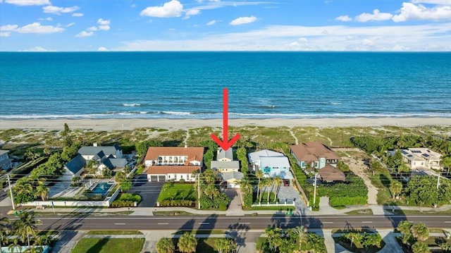 943 S Atlantic Ave, Cocoa Beach, FL 32931 - aerial view of property and surrounding area with extended coastline