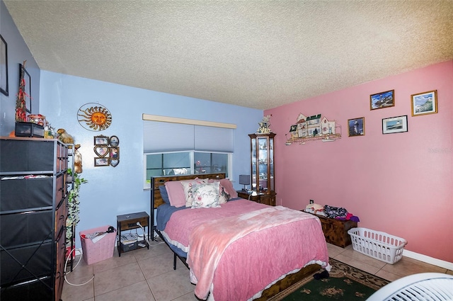4831 Cypress Tree Dr, Tampa, FL 33624 - tiled bedroom featuring a textured ceiling