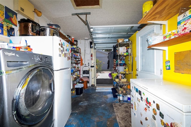 4831 Cypress Tree Dr, Tampa, FL 33624 - basement with washer / clothes dryer, a garage, refrigerator, and a textured ceiling