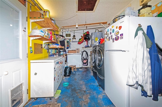 4831 Cypress Tree Dr, Tampa, FL 33624 - garage featuring freestanding refrigerator, washing machine and dryer, and electric water heater