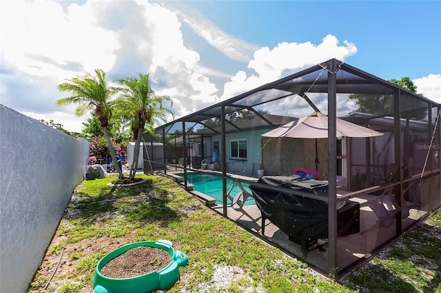 4831 Cypress Tree Dr, Tampa, FL 33624 - view of swimming pool featuring a fenced backyard, glass enclosure, and a patio