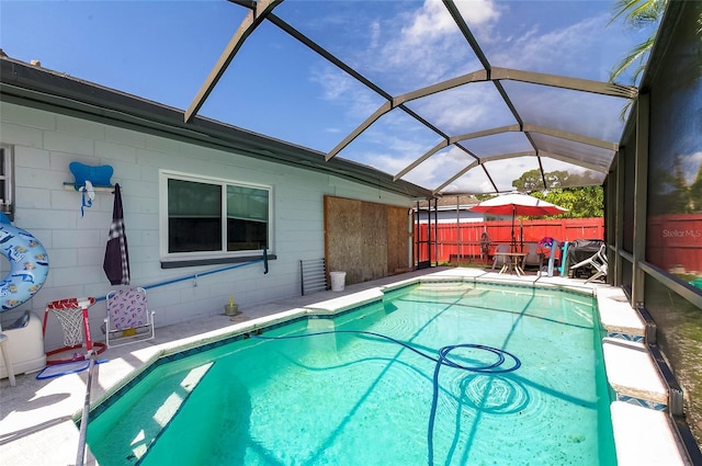 4831 Cypress Tree Dr, Tampa, FL 33624 - view of pool with glass enclosure and a patio area