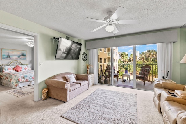 4 Oceans W Blvd Unit 308C, Daytona Beach, FL 32118 - living room featuring carpet, ceiling fan, and a textured ceiling