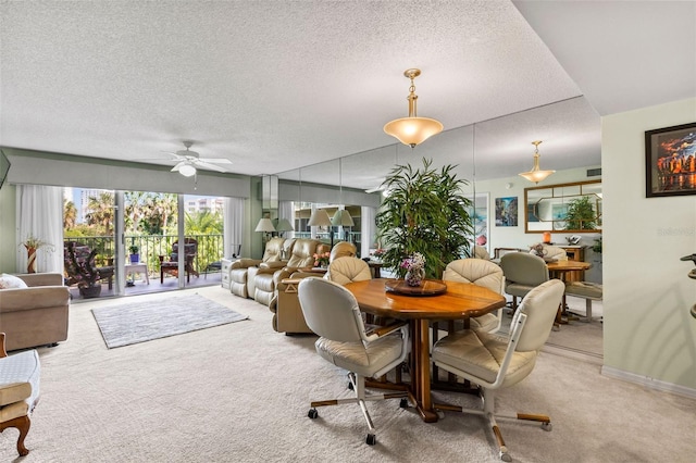 4 Oceans W Blvd Unit 308C, Daytona Beach, FL 32118 - carpeted dining room with a textured ceiling and a ceiling fan