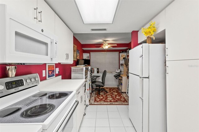 4 Oceans W Blvd Unit 308C, Daytona Beach, FL 32118 - kitchen with white appliances, white cabinetry, light countertops, and ceiling fan