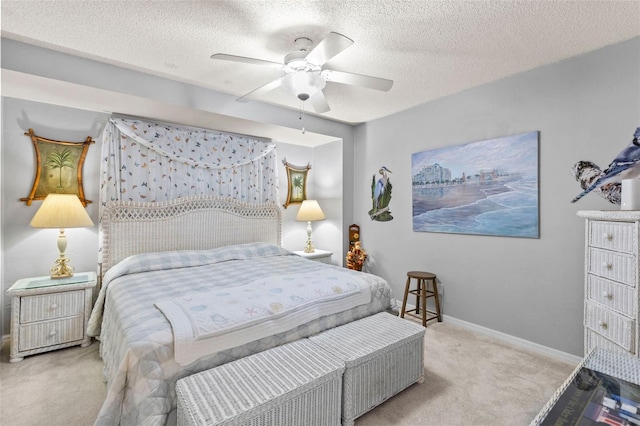 4 Oceans W Blvd Unit 308C, Daytona Beach, FL 32118 - bedroom featuring carpet floors, a textured ceiling, and a ceiling fan