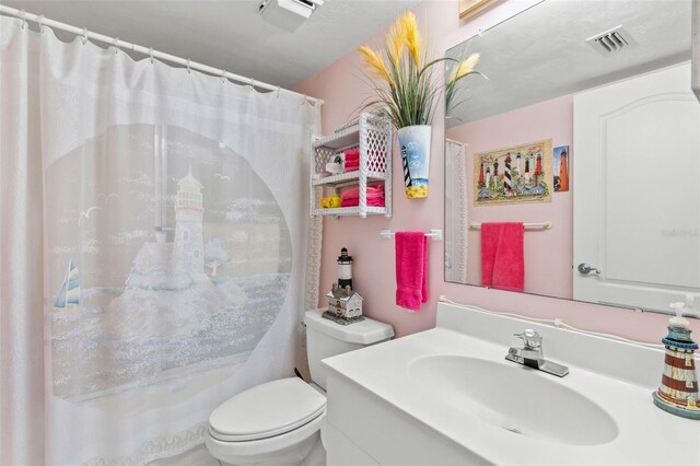 4 Oceans W Blvd Unit 308C, Daytona Beach, FL 32118 - bathroom with vanity and curtained shower
