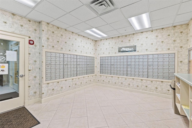 4 Oceans W Blvd Unit 308C, Daytona Beach, FL 32118 - view of community featuring wallpapered walls, mail area, and a drop ceiling