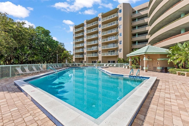 4 Oceans W Blvd Unit 308C, Daytona Beach, FL 32118 - community pool featuring a patio