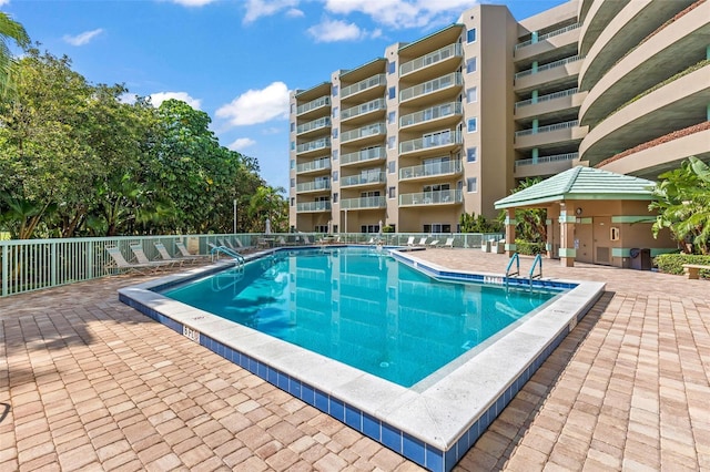 4 Oceans W Blvd Unit 308C, Daytona Beach, FL 32118 - community pool featuring a patio area