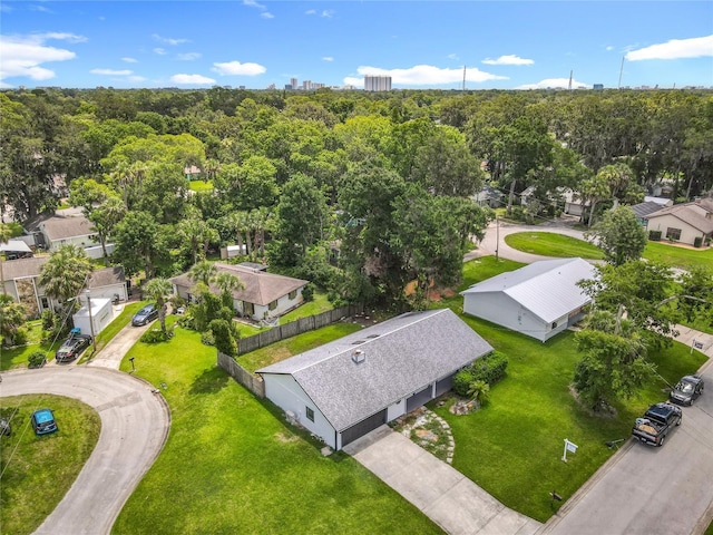 1019 Chippewa Trl, Daytona Beach, FL 32117 - aerial perspective of suburban area with a heavily wooded area