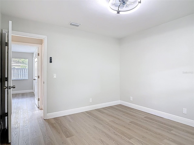1019 Chippewa Trl, Daytona Beach, FL 32117 - unfurnished room with light wood-style floors and baseboards