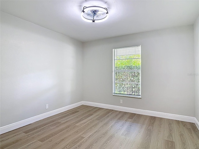 1019 Chippewa Trl, Daytona Beach, FL 32117 - spare room featuring light wood-type flooring and baseboards
