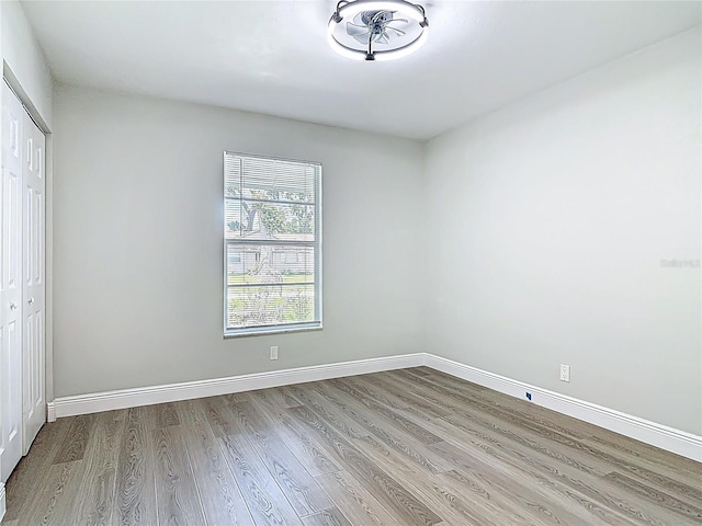 1019 Chippewa Trl, Daytona Beach, FL 32117 - unfurnished bedroom with wood finished floors and a closet