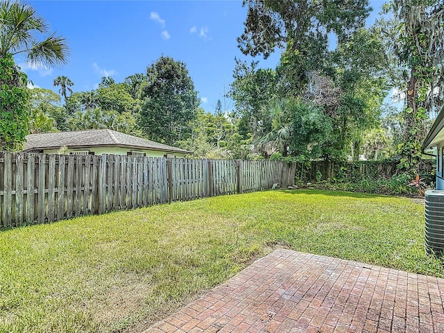 1019 Chippewa Trl, Daytona Beach, FL 32117 - fenced backyard with a patio area
