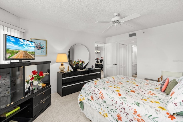 3 Oceans W Blvd Unit 3A7, Daytona Beach Shores, FL 32118 - carpeted bedroom featuring a textured ceiling and ceiling fan