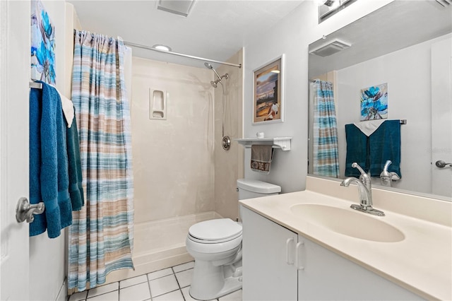 3 Oceans W Blvd Unit 3A7, Daytona Beach Shores, FL 32118 - bathroom with tile patterned floors, vanity, and a shower with shower curtain
