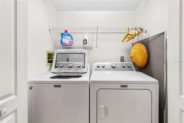3 Oceans W Blvd Unit 3A7, Daytona Beach Shores, FL 32118 - washroom featuring separate washer and dryer