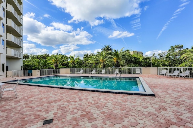 3 Oceans W Blvd Unit 3A7, Daytona Beach Shores, FL 32118 - community pool featuring a patio